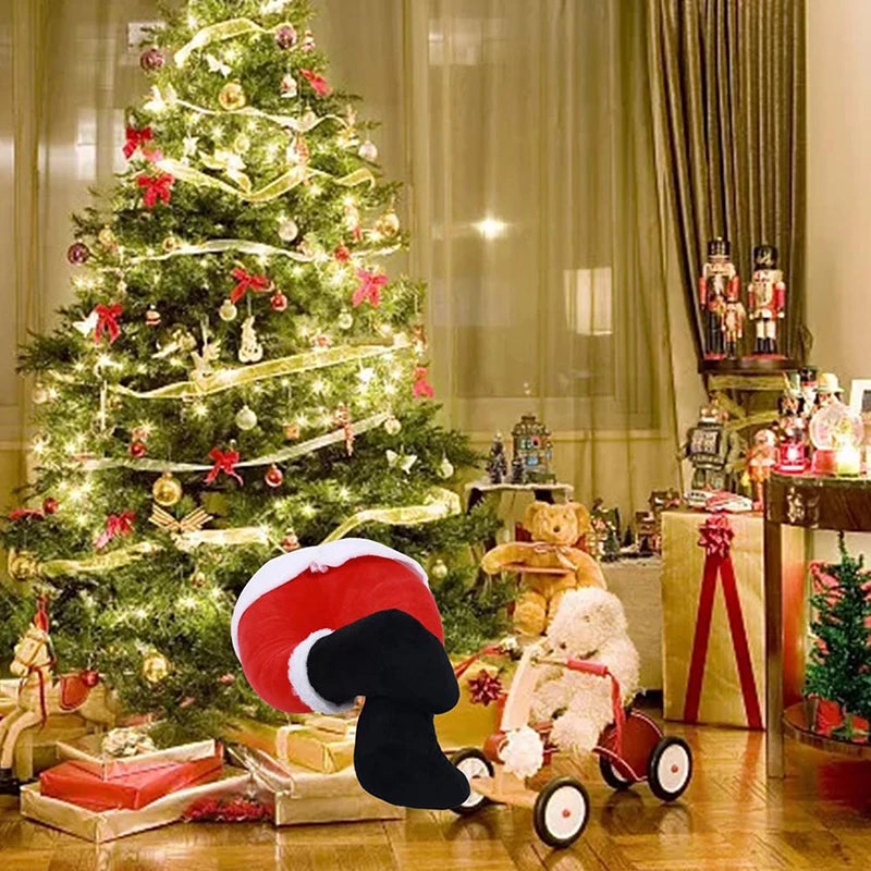 Jambes du Père Noël fixées sur une porte