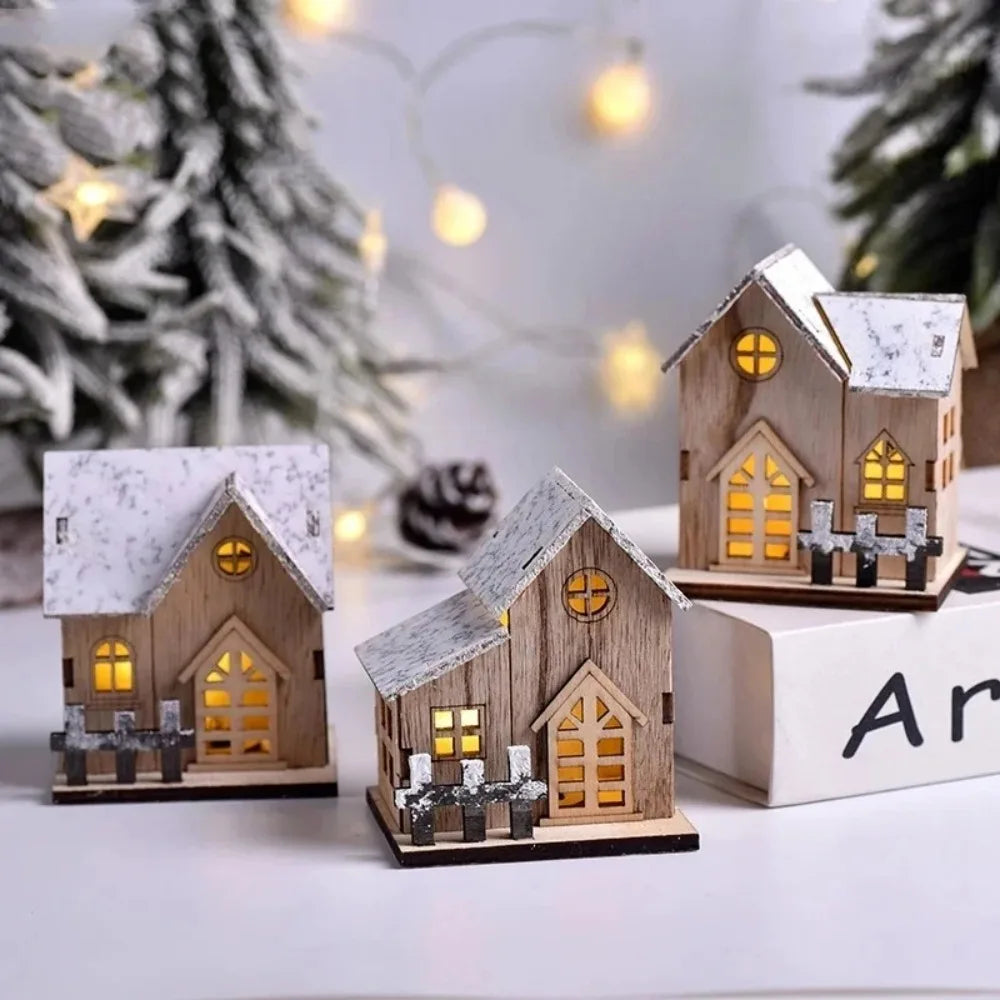 Maison de Noël LED en bois allumée